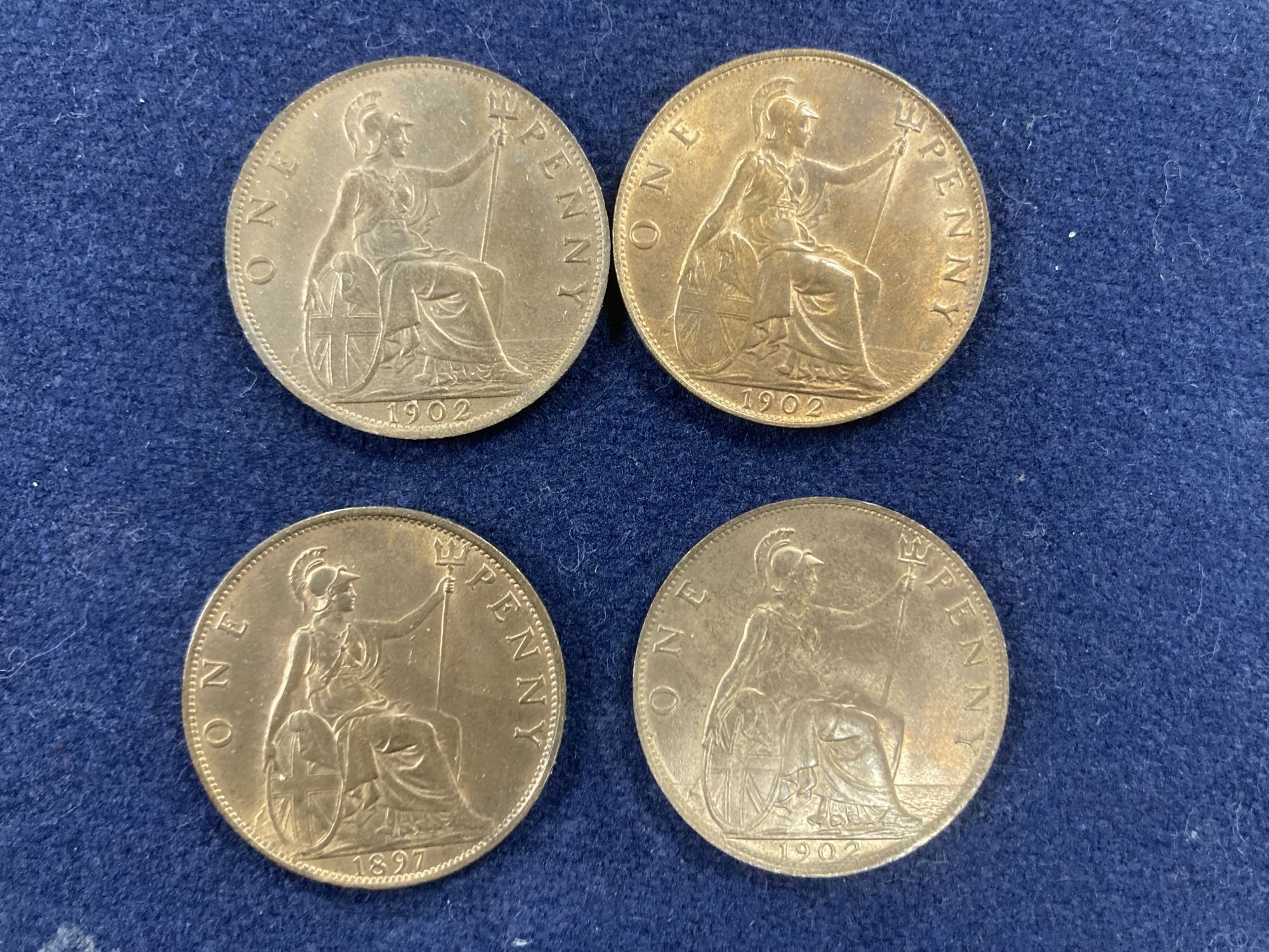 Victoria and Edward VII one pennies, 1897 UNC with much lustre, and three examples of 1902 all UNC with much lustre (4)